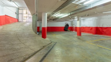 Parking place in a communal building