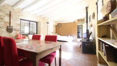 Rustic stone house for sale with three houses and garden in Avinyonet de Puigventós.