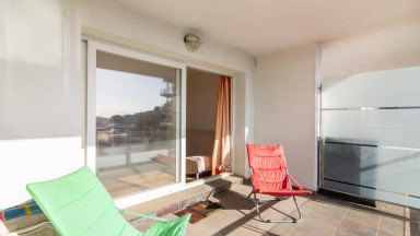 Apartment with two bedrooms and views of the community pool.