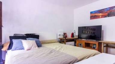 CASA ADOSSADA SITUADA A LA POBLACIÓ D'AMER