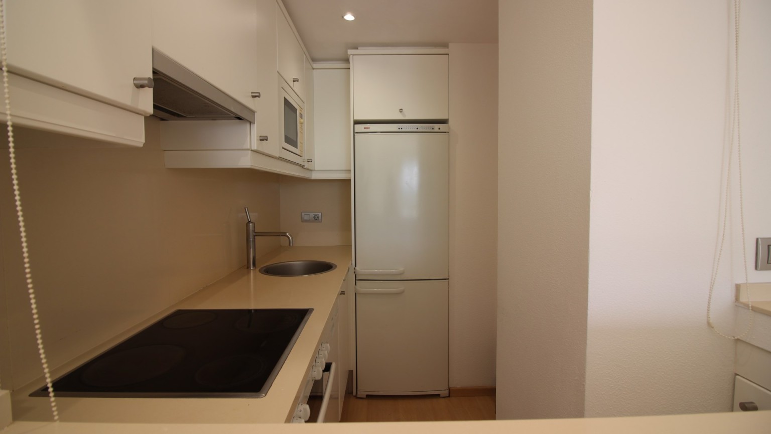 Appartement à vendre, complexe résidentiel Port Gran, avec deux chambres, parking et piscine commune.