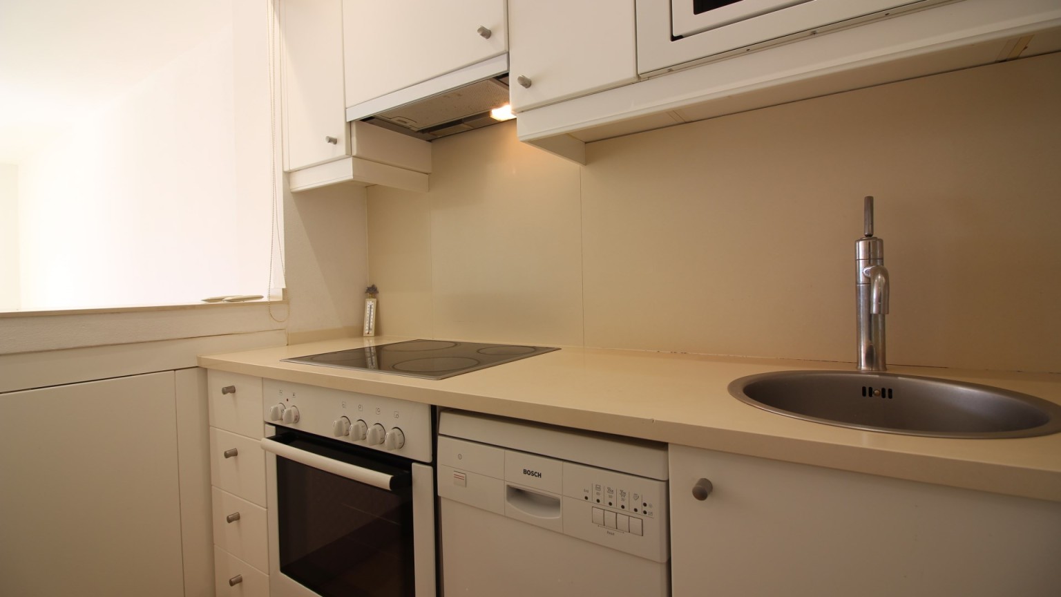 Appartement à vendre, complexe résidentiel Port Gran, avec deux chambres, parking et piscine commune.