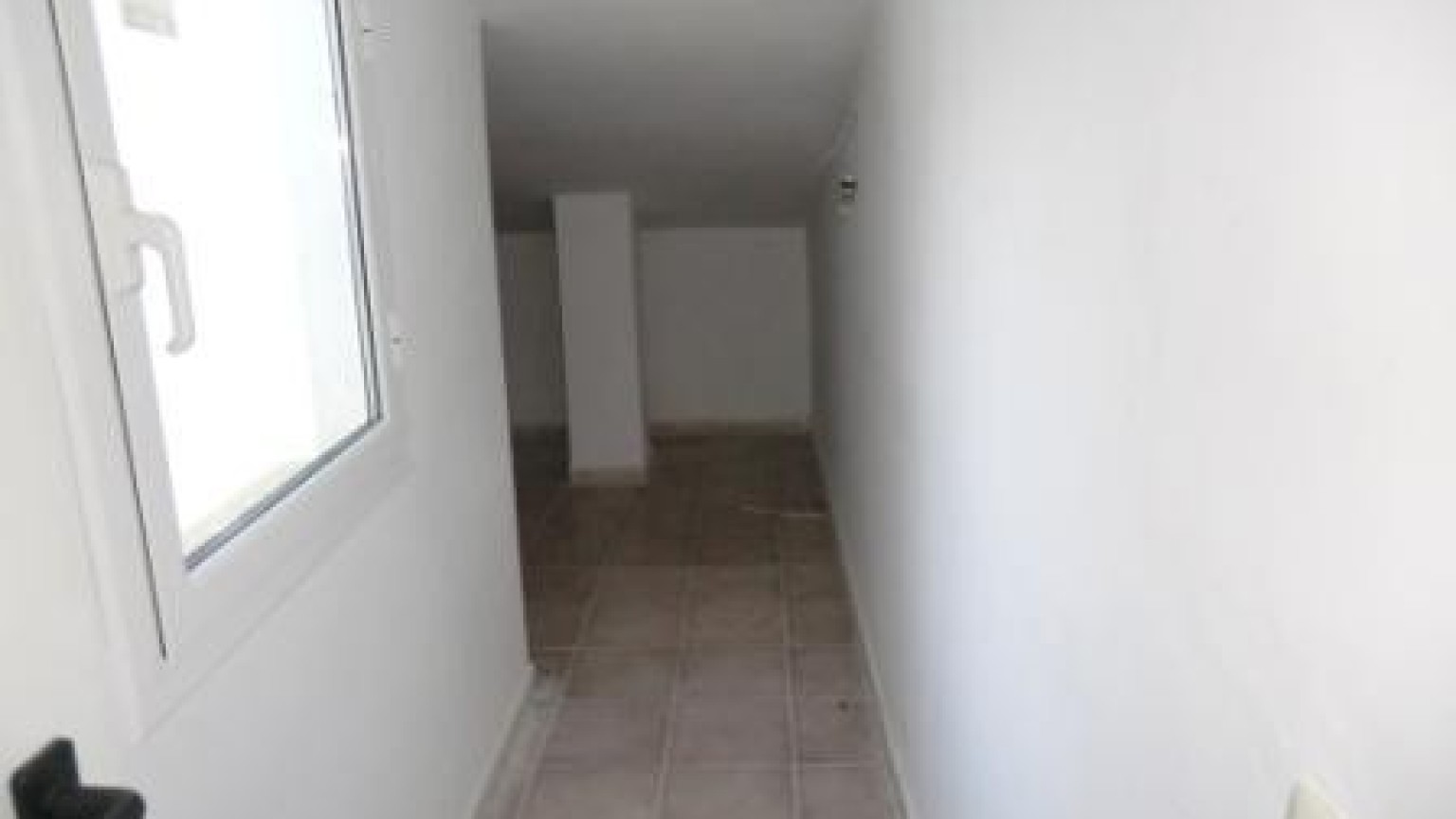 Piso en el centro de Roses, con dos dormitorios, plaza de parking y trastero.