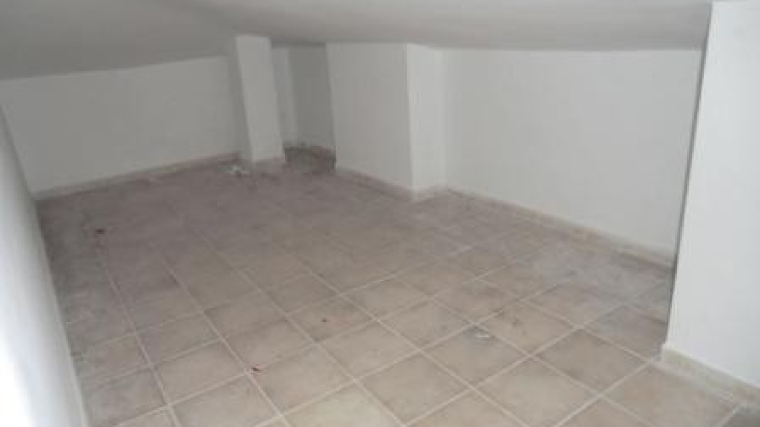 Piso en el centro de Roses, con dos dormitorios, plaza de parking y trastero.