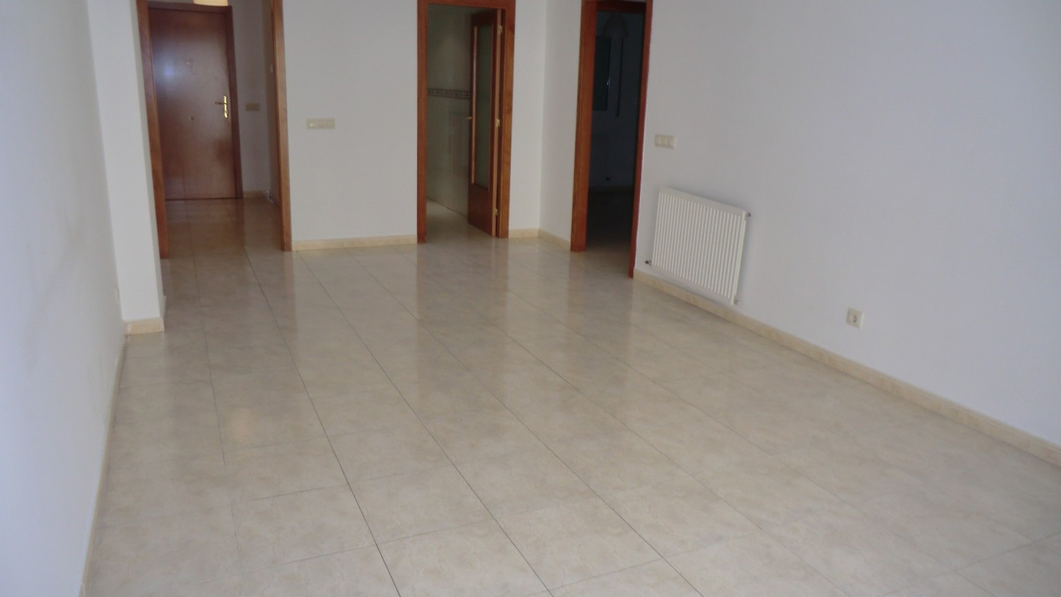 Piso en el centro de Roses, con dos dormitorios, plaza de parking y trastero.