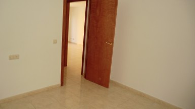 Piso en el centro de Roses, con dos dormitorios, plaza de parking y trastero.